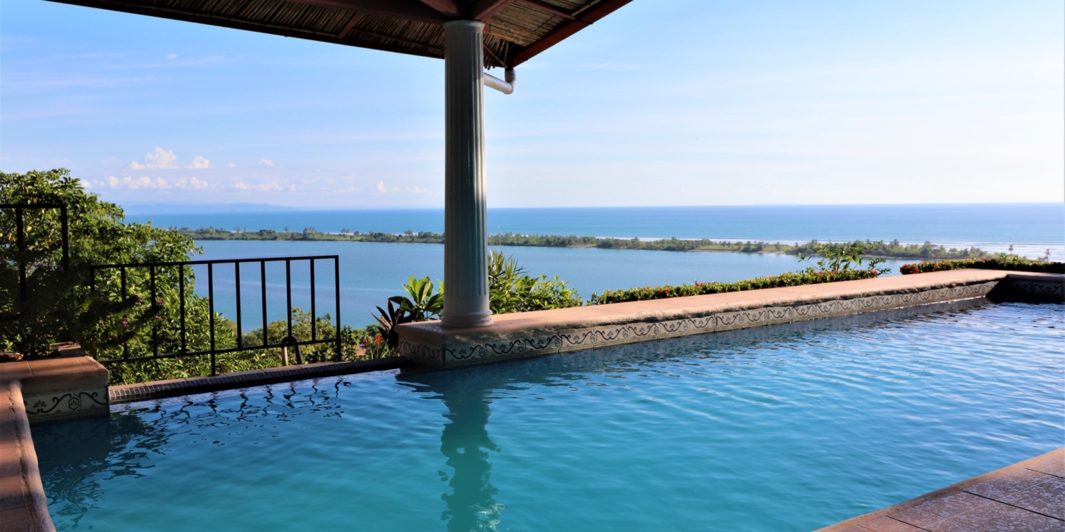 House & Cabins With Outstanding Ocean, Sunset & Mountain Views on the Front Ridge in Ojochal Costa Rica