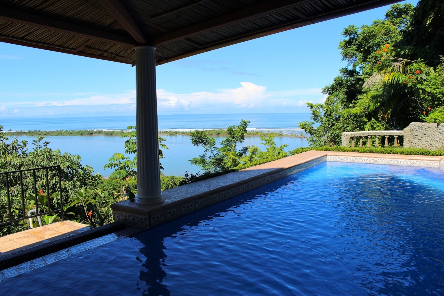 House & Cabins With Outstanding Ocean, Sunset & Mountain Views on the Front Ridge in Ojochal Costa Rica