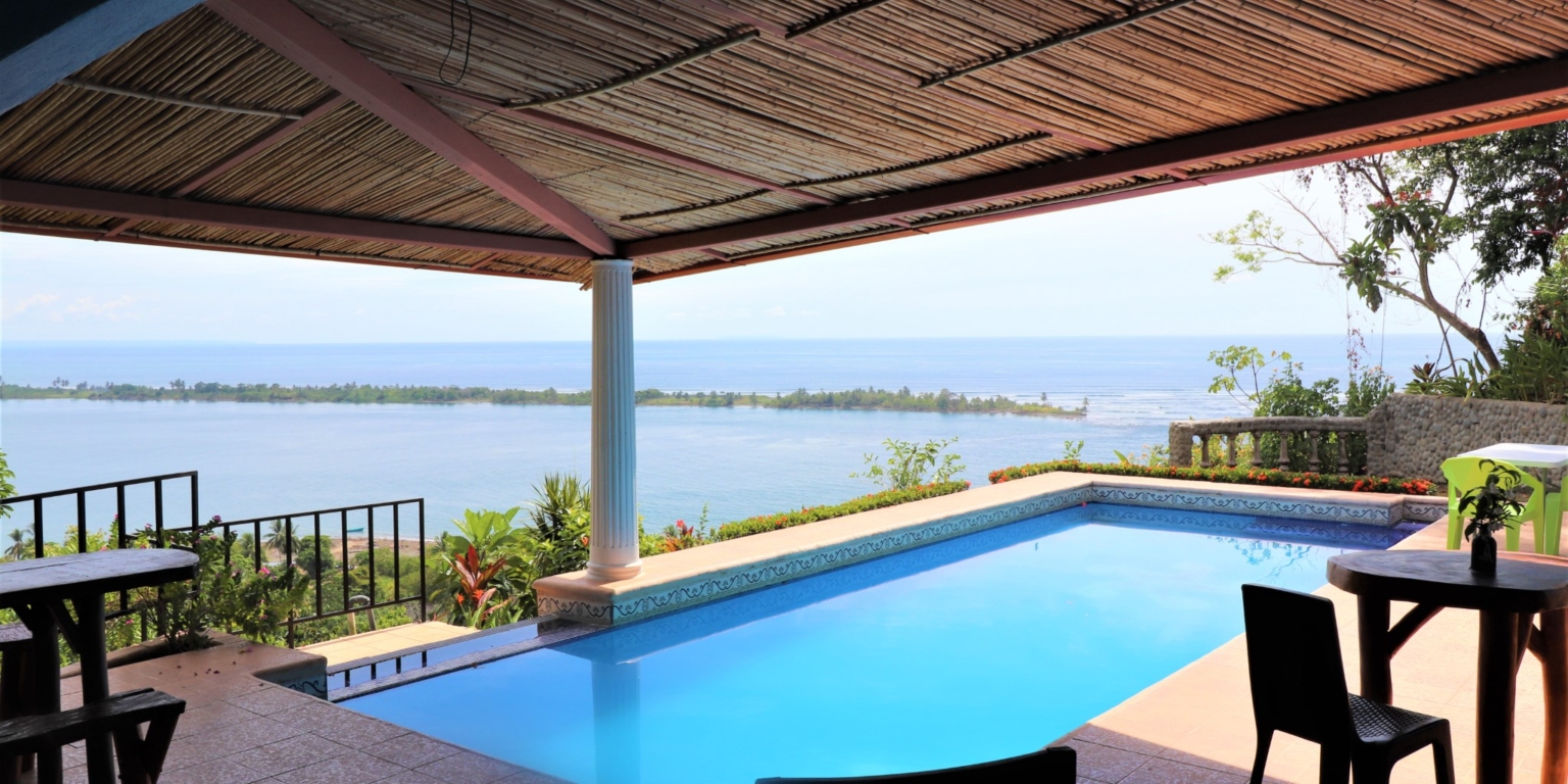 House & Cabins With Outstanding Ocean, Sunset & Mountain Views on the Front Ridge in Ojochal Costa Rica