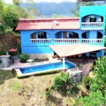 House & Cabins With Outstanding Ocean, Sunset & Mountain Views on the Front Ridge in Ojochal Costa Rica