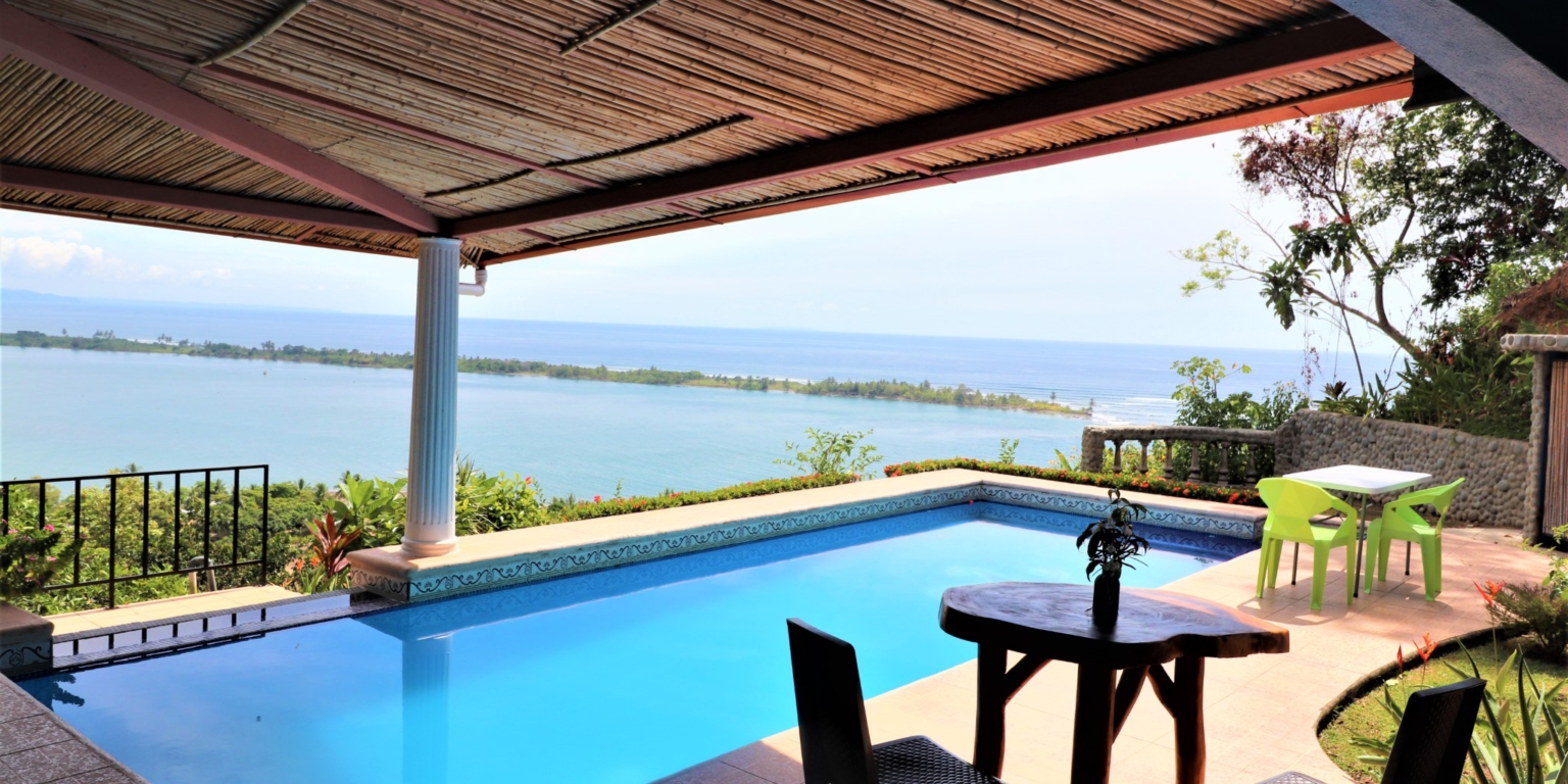 House & Cabins With Outstanding Ocean, Sunset & Mountain Views on the Front Ridge in Ojochal Costa Rica