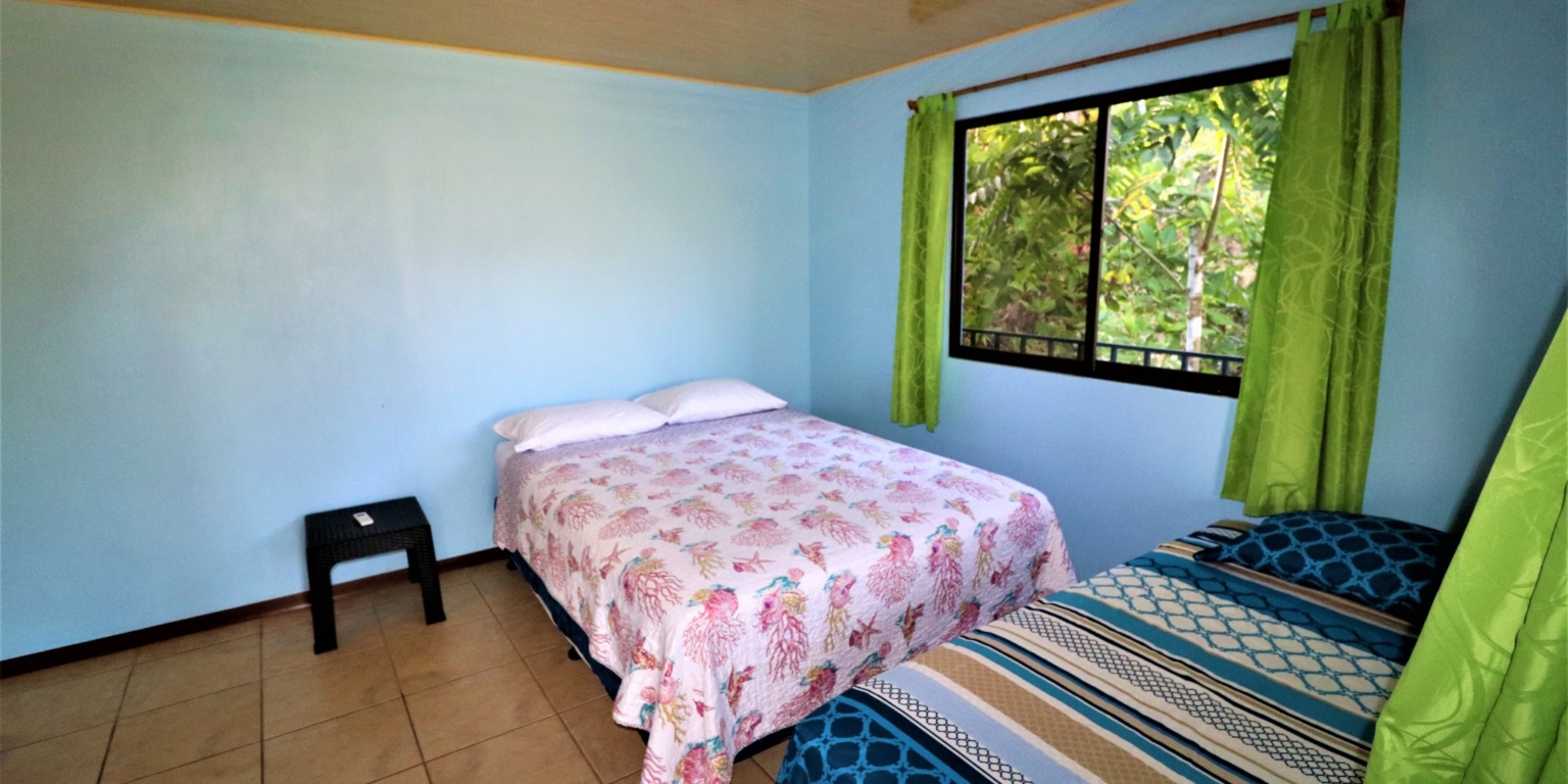 House & Cabins With Outstanding Ocean, Sunset & Mountain Views on the Front Ridge in Ojochal Costa Rica