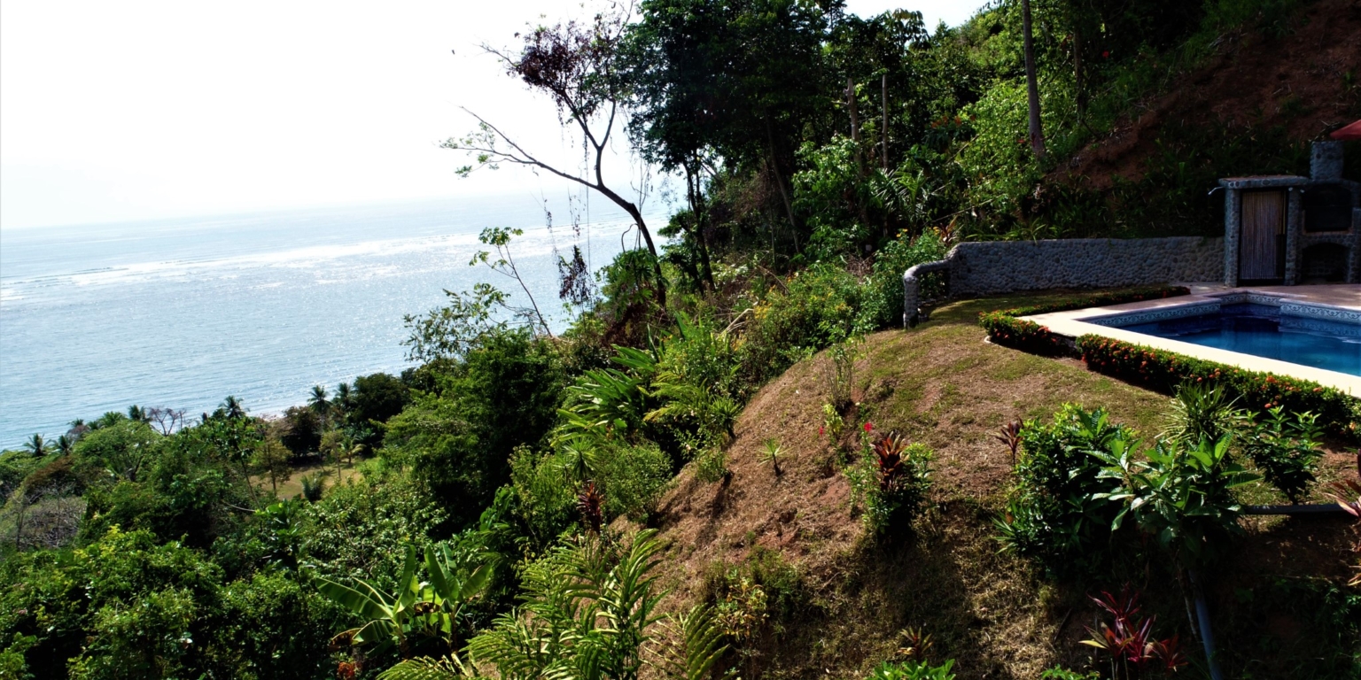House & Cabins With Outstanding Ocean, Sunset & Mountain Views on the Front Ridge in Ojochal Costa Rica