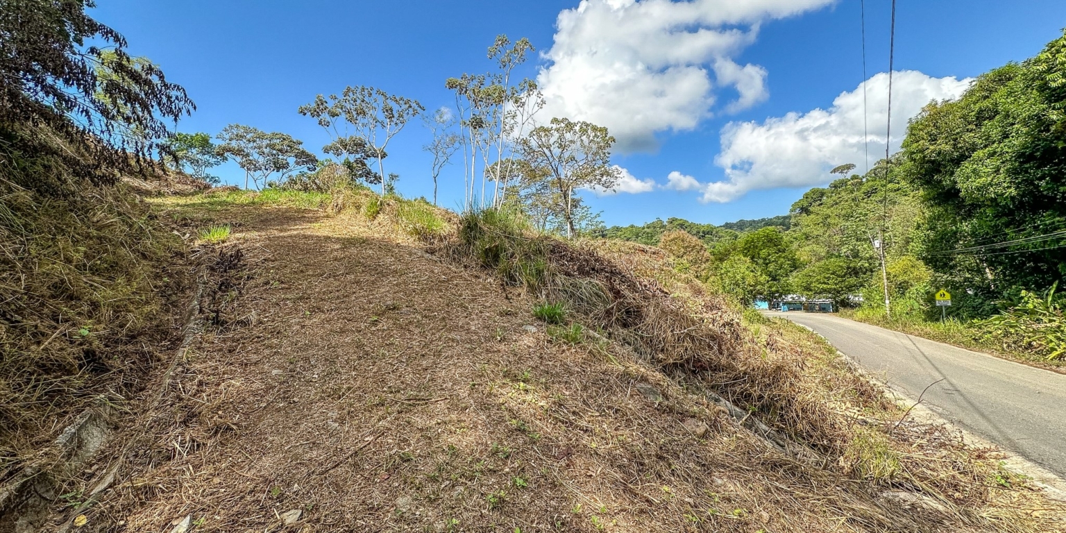 Elevated 1.2 Acre Lot with Two Building Ties with Panoramic Mountain & Jungle Views, Paved-Road Access & Year-Round Mountain River in Tres Rios near Ojochal Costa Rica Elevated 1.2 Acre Lot with Two Building Ties with Panoramic Mountain & Jungle Views, Paved-Road Access & Year-Round Mountain River in Tres Rios near Ojochal Costa Rica