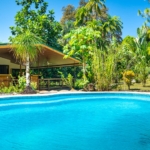 Gorgeous River Front Property with Multiple Cabins, Owner-House & Pool in Prime Location in Ojochal Costa Rica