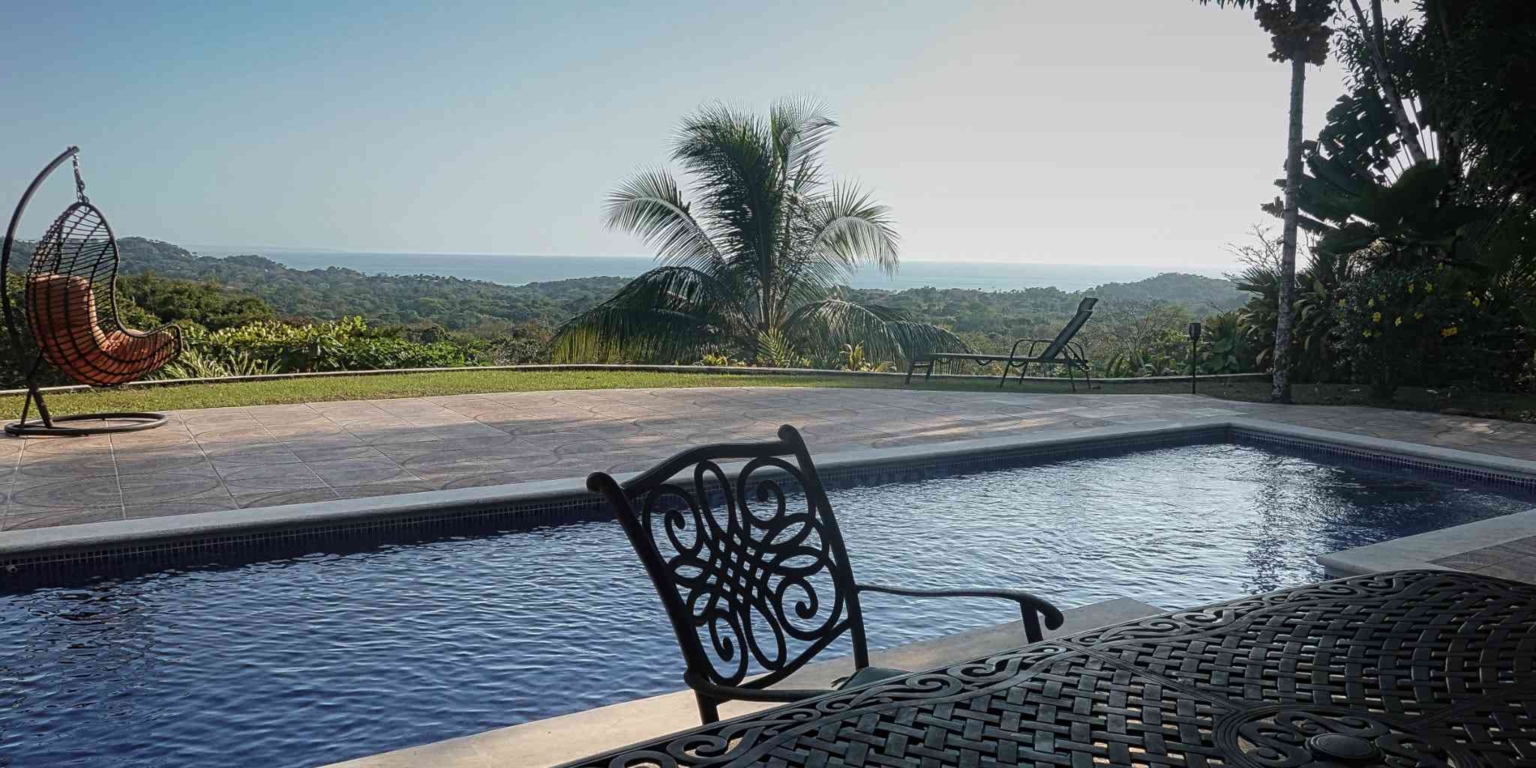 23 (3) Ocean View 3-Bedroom Home with Easy Access and Sparkling Pool in Ojochal Costa Rica