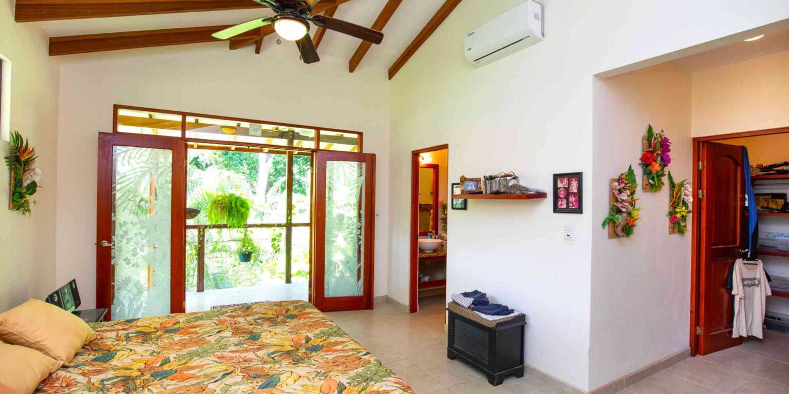 Comfortable 2-Bedroom Home in Riverside Community with Community Pool & Waterfall in Tres Rios Costa Rica