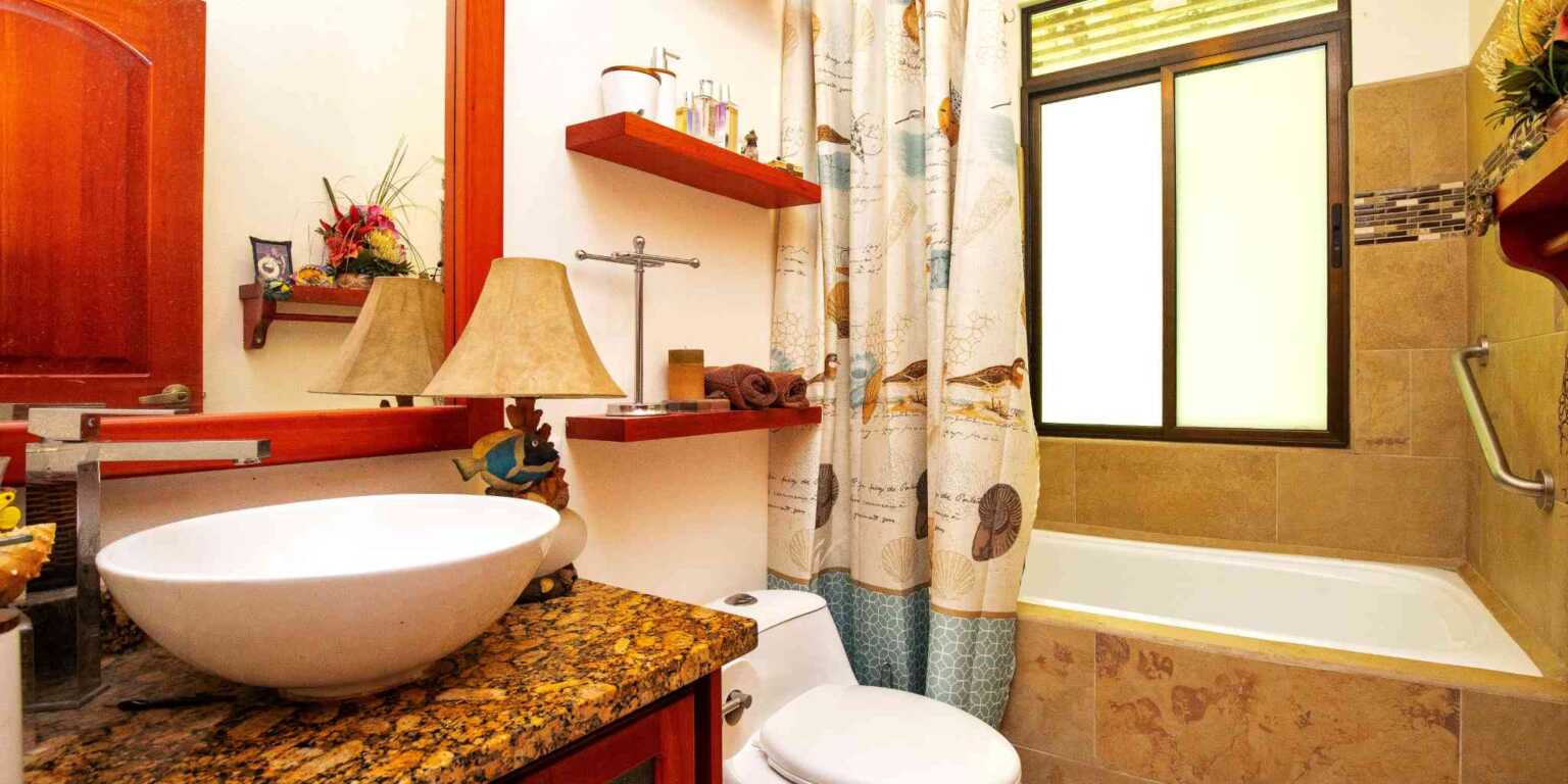 Comfortable 2-Bedroom Home in Riverside Community with Community Pool & Waterfall in Tres Rios Costa Rica