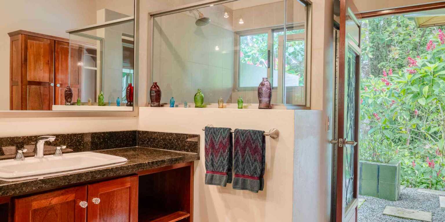 TropicalInvestments_CasaEscondida_CostaVerdes_Osa_CostaRica_–6 Stunning 3-Bedroom Home with Whale’s Tail View on Estate Property with Space to Build your Dream Home in Costa Verde Estates above Dominical Costa Rica