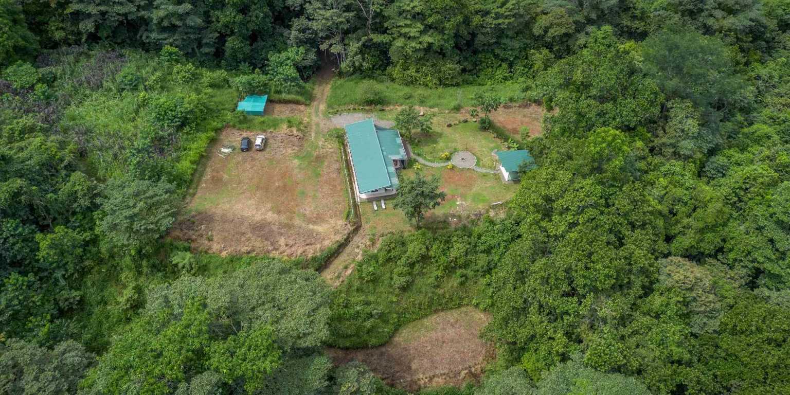 Beautiful Hidden Away 2-Bedroom Home on 2.5 Acres of Land Bordered by a River in Ojochal Costa Rica