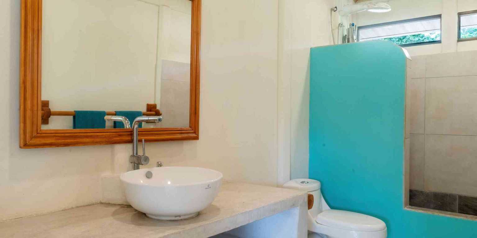 Beautiful Hidden Away 2-Bedroom Home on 2.5 Acres of Land Bordered by a River in Ojochal Costa Rica