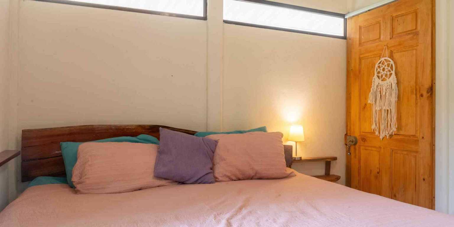 Beautiful Hidden Away 2-Bedroom Home on 2.5 Acres of Land Bordered by a River in Ojochal Costa Rica