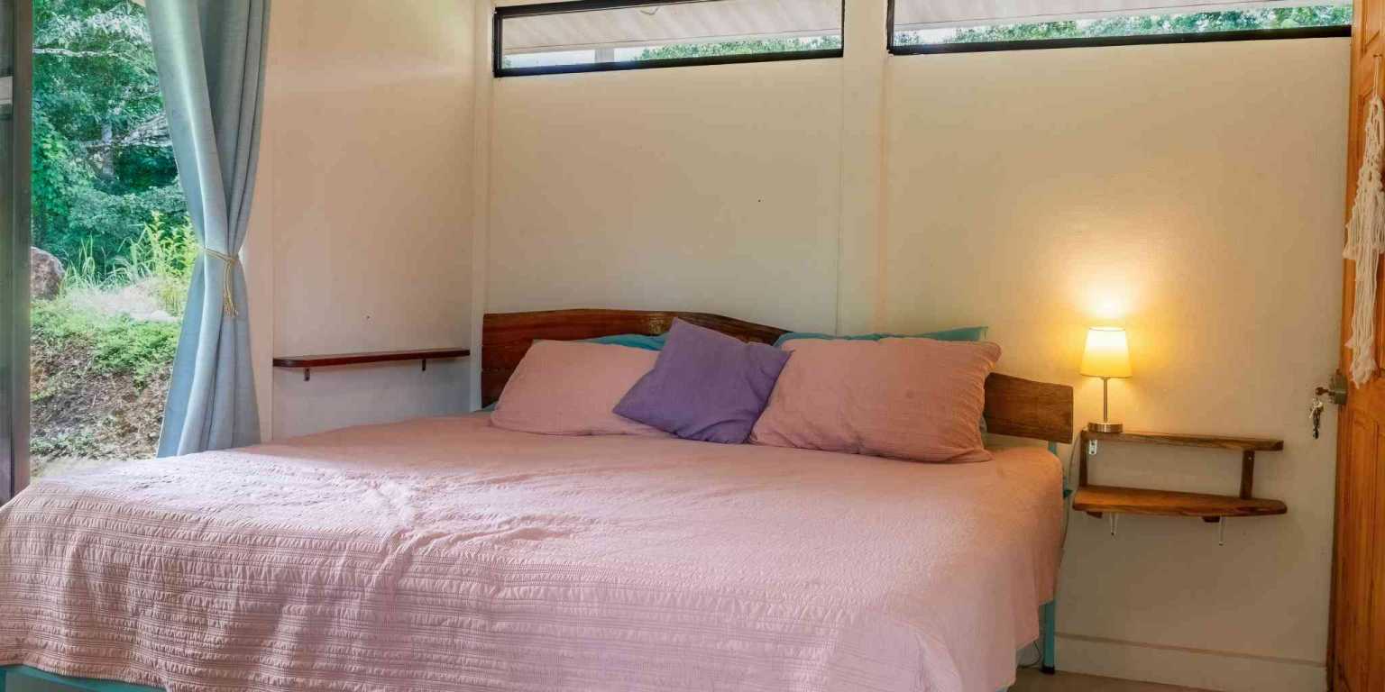 Beautiful Hidden Away 2-Bedroom Home on 2.5 Acres of Land Bordered by a River in Ojochal Costa Rica
