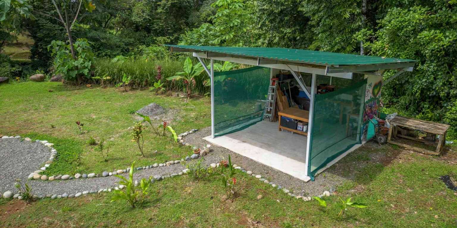 Beautiful Hidden Away 2-Bedroom Home on 2.5 Acres of Land Bordered by a River in Ojochal Costa Rica