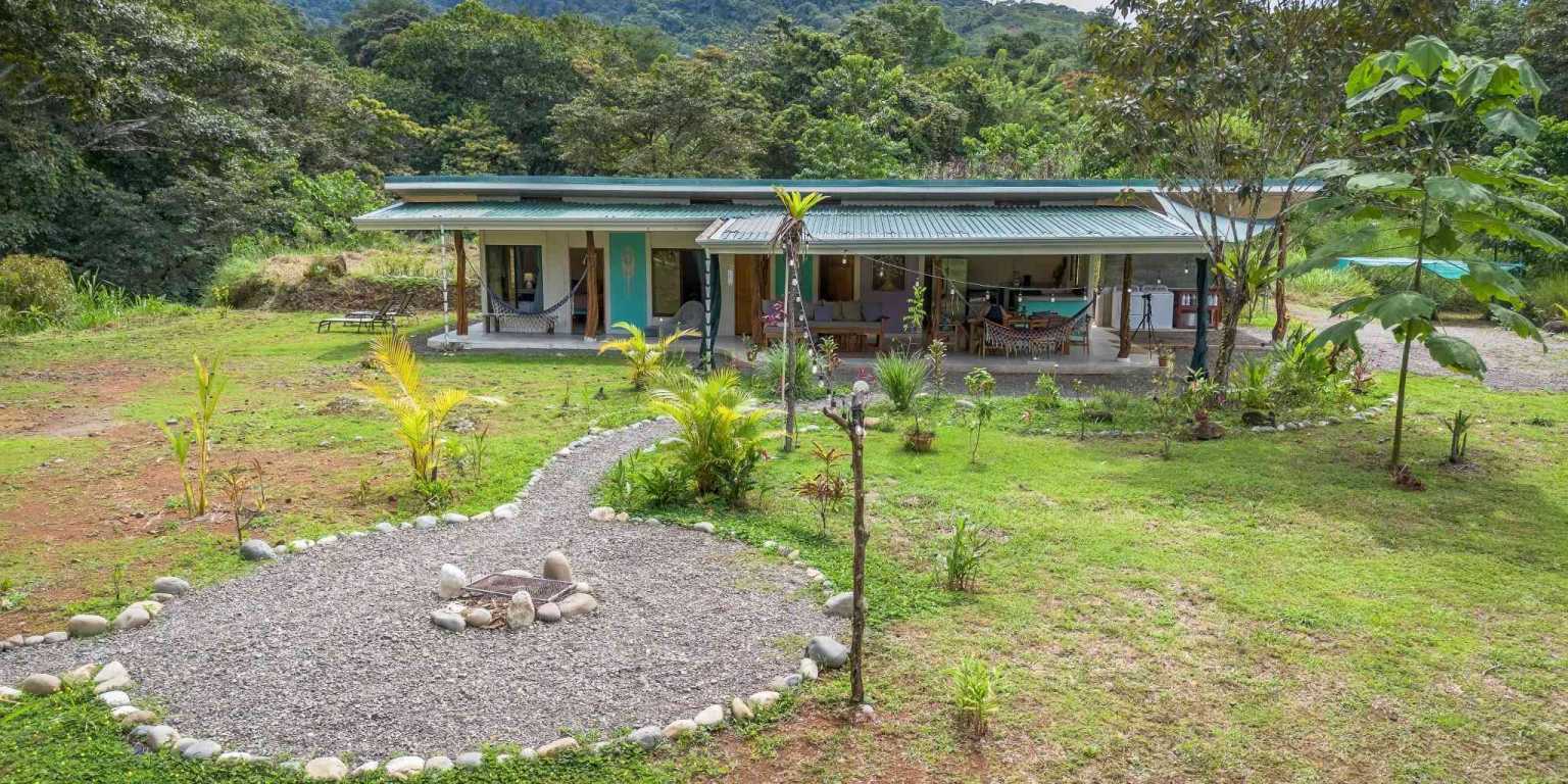 Beautiful Hidden Away 2-Bedroom Home on 2.5 Acres of Land Bordered by a River in Ojochal Costa Rica