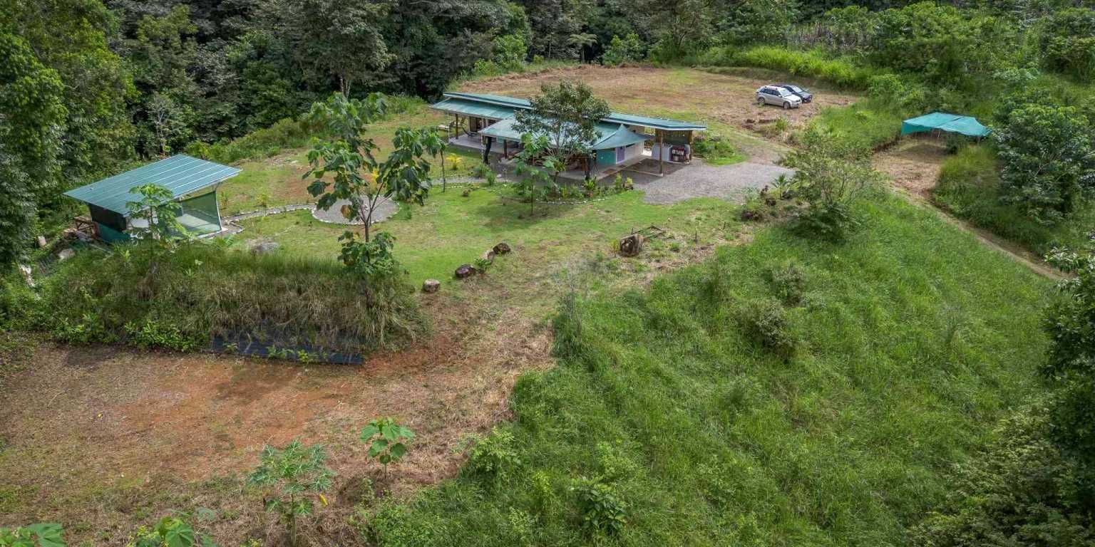 Beautiful Hidden Away 2-Bedroom Home on 2.5 Acres of Land Bordered by a River in Ojochal Costa Rica