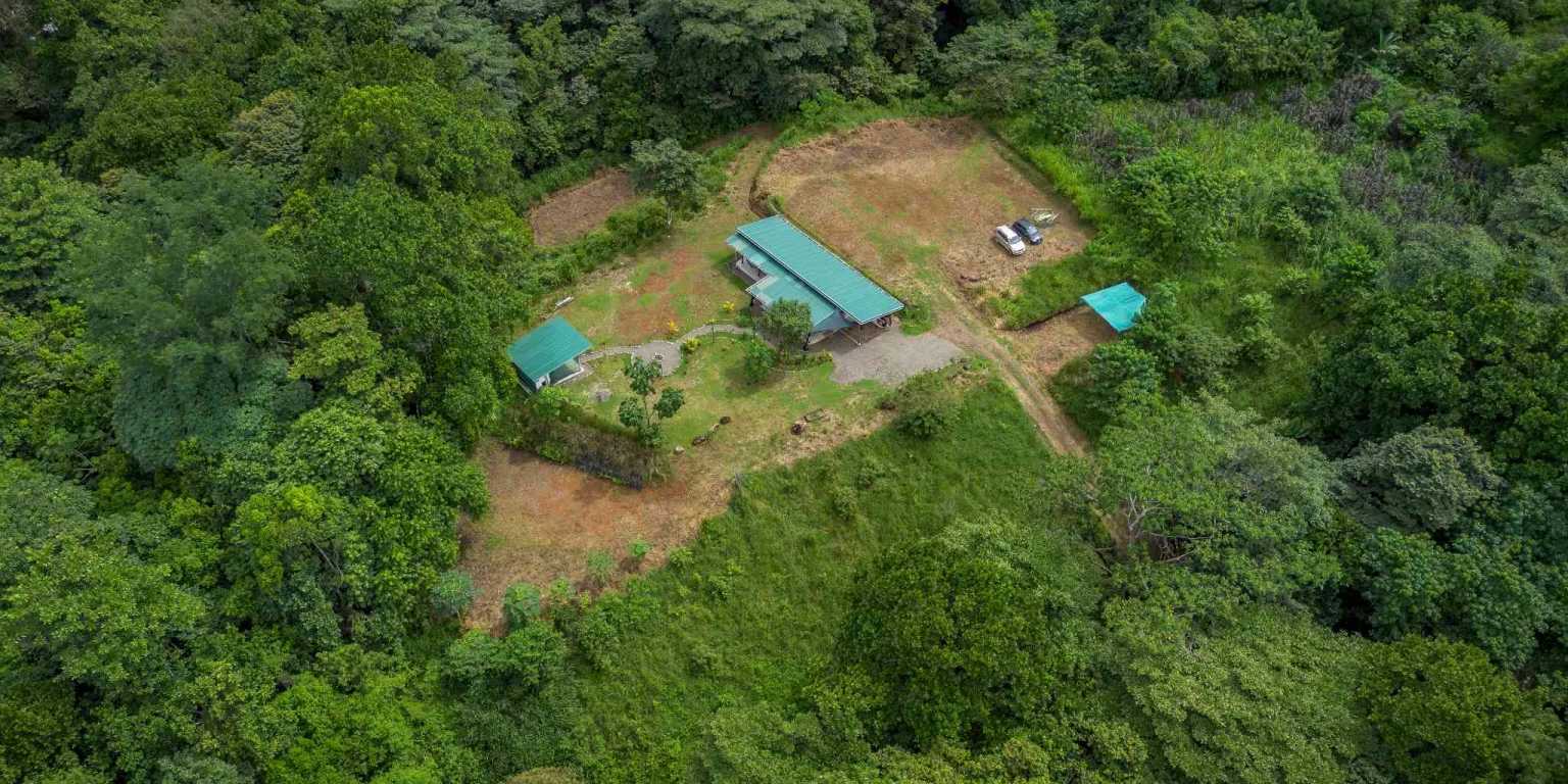 Beautiful Hidden Away 2-Bedroom Home on 2.5 Acres of Land Bordered by a River in Ojochal Costa Rica