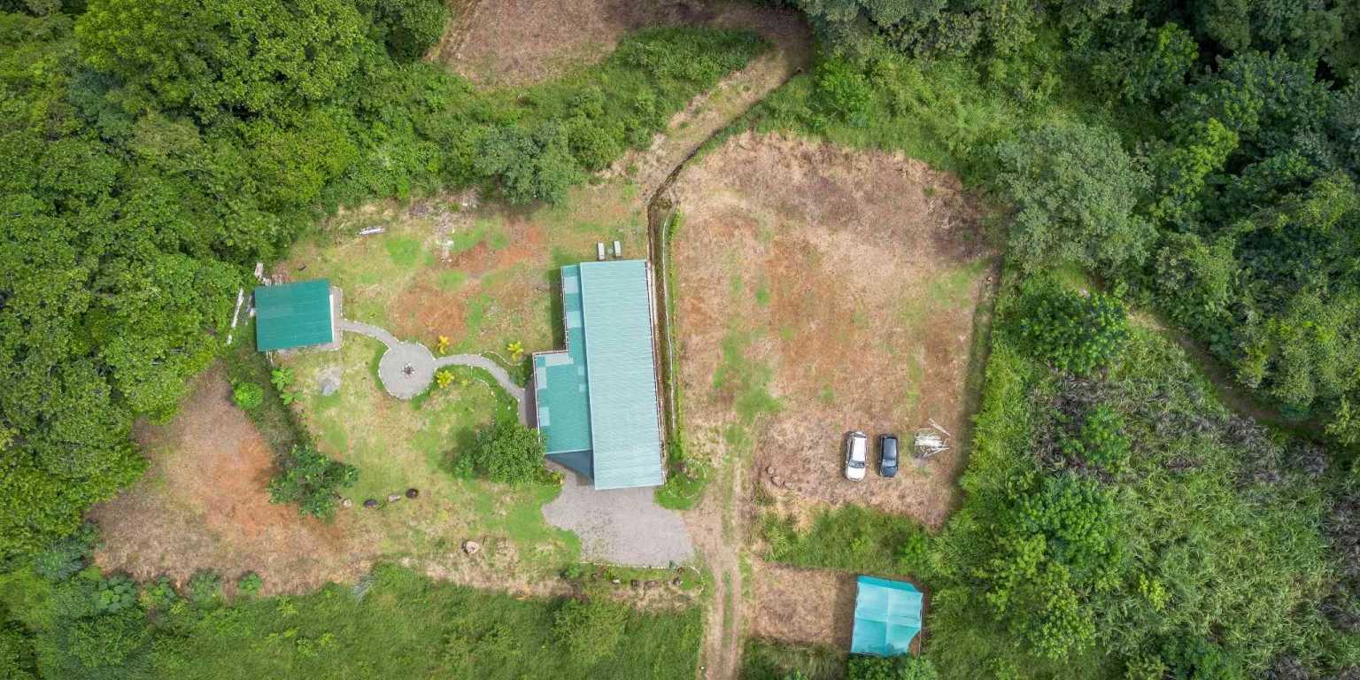 Beautiful Hidden Away 2-Bedroom Home on 2.5 Acres of Land Bordered by a River in Ojochal Costa Rica