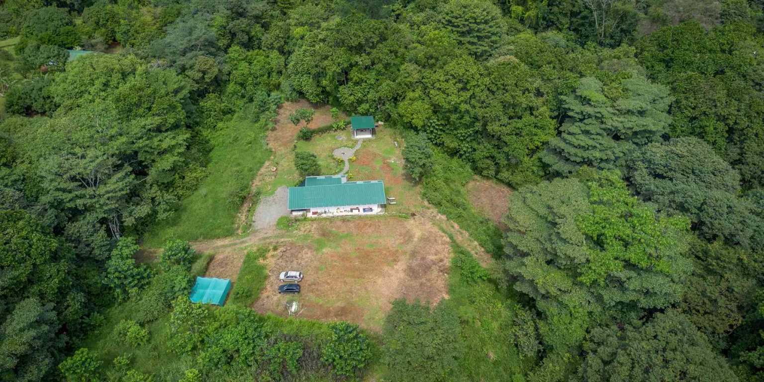 Beautiful Hidden Away 2-Bedroom Home on 2.5 Acres of Land Bordered by a River in Ojochal Costa Rica