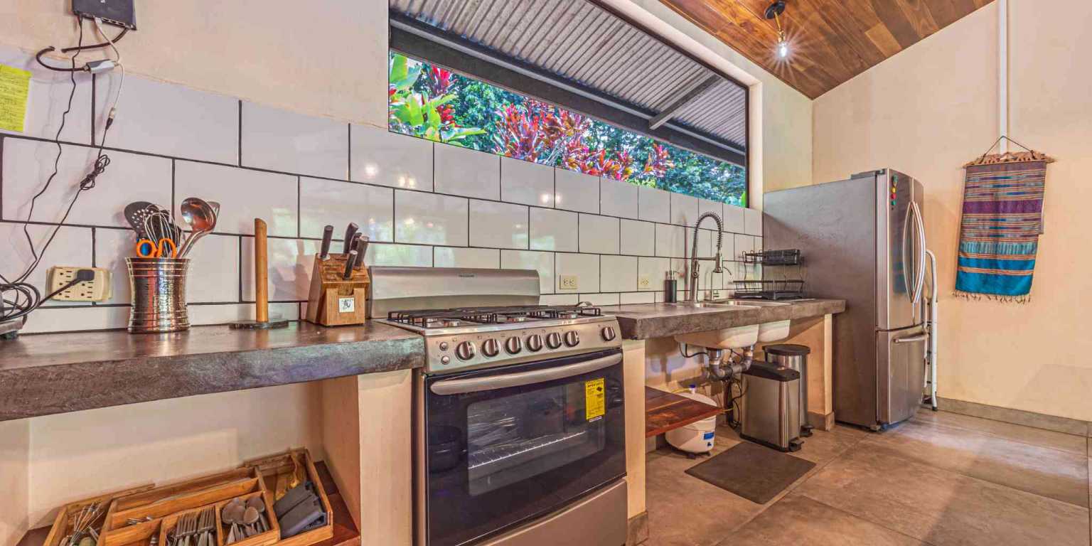 ConeCat-08 Tropical 3-Bedroom Home Hideaway with 7 Acres of Secluded Riverfront on Cinco Ventanas Road in Ojochal Costa Rica