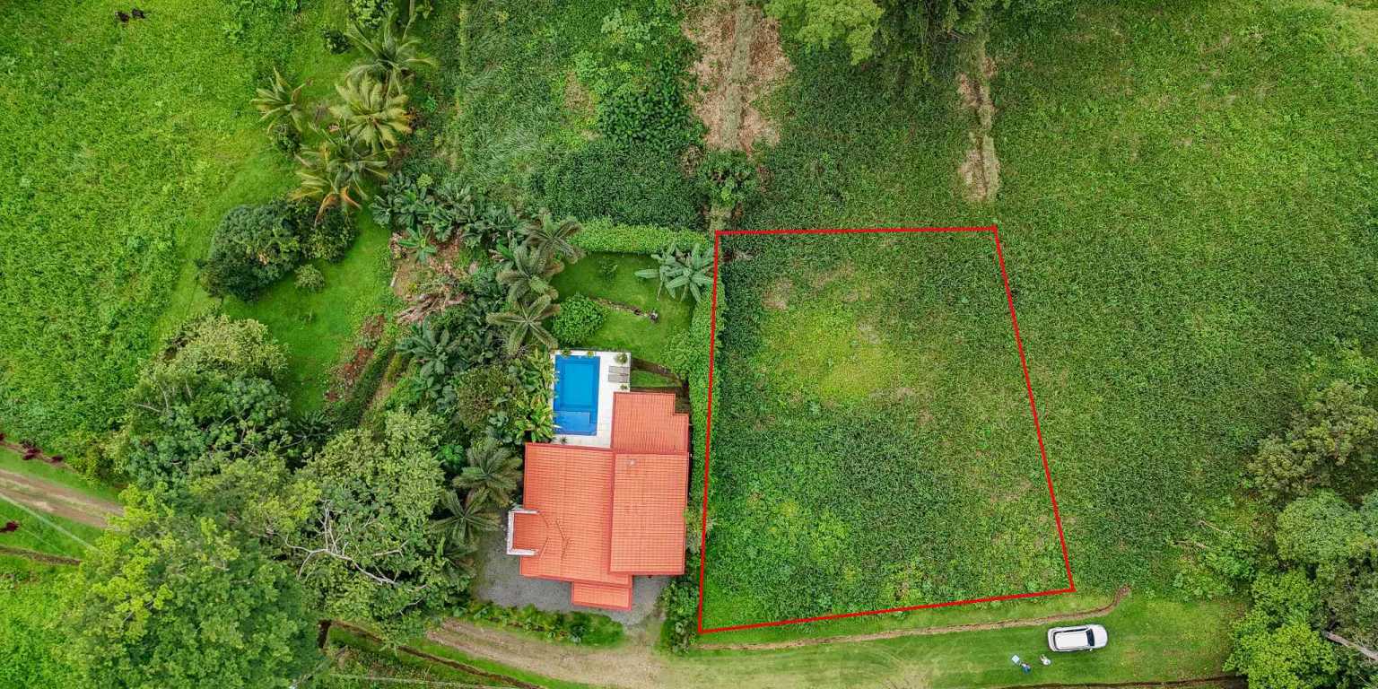 100 (5) Beautiful Sunny Lot in a Secure Gated Community with a Nearby Creek & Jungle-Covered Valley in Ojochal Costa Rica
