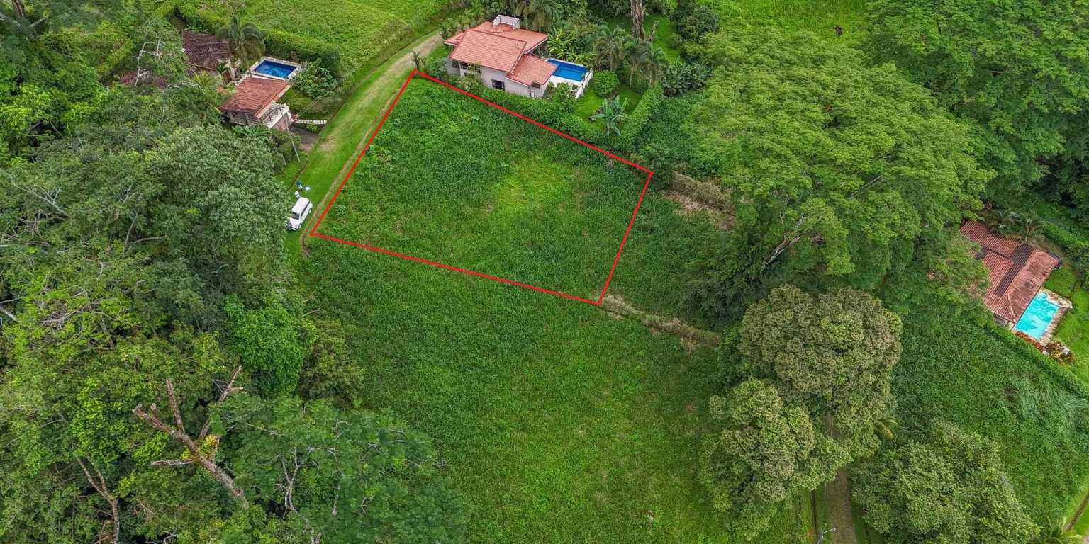 100 (7) Beautiful Sunny Lot in a Secure Gated Community with a Nearby Creek & Jungle-Covered Valley in Ojochal Costa Rica