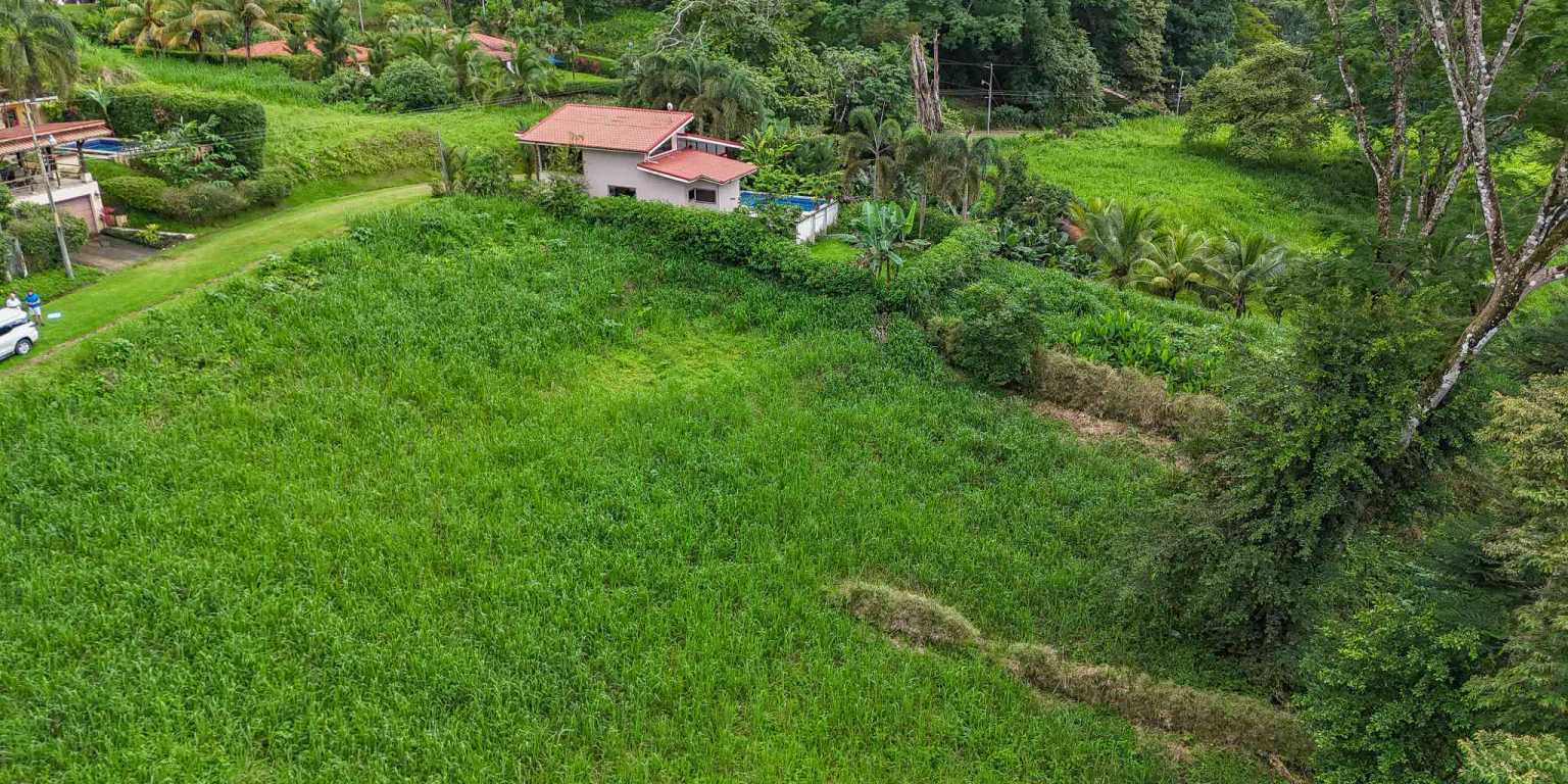 100 (9) Beautiful Sunny Lot in a Secure Gated Community with a Nearby Creek & Jungle-Covered Valley in Ojochal Costa Rica