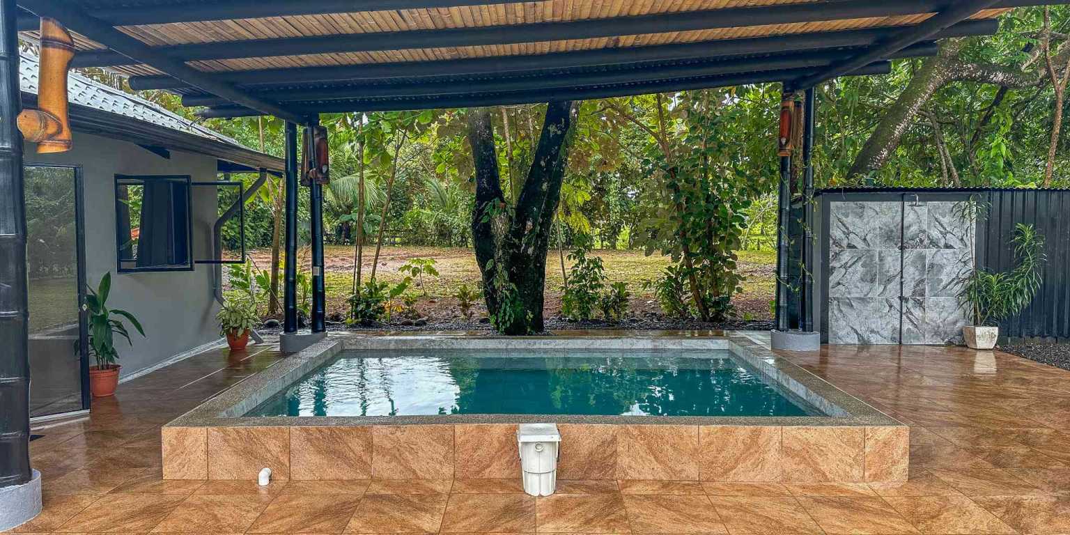 1 (53) Contemporary 3-Bedroom Home Surrounded by Uvita’s Amenities but Just a Short Stroll to Tropical Beaches in Uvita Costa Rica