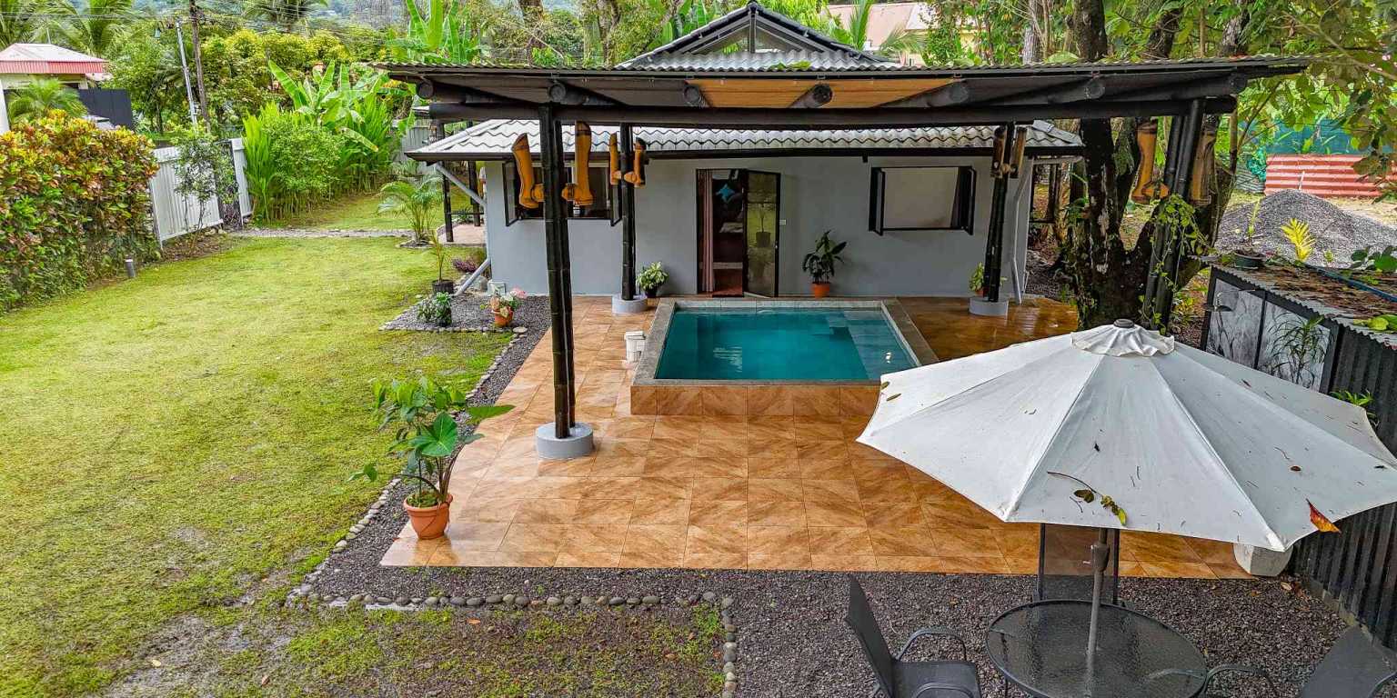 1 (50) Contemporary 3-Bedroom Home Surrounded by Uvita’s Amenities but Just a Short Stroll to Tropical Beaches in Uvita Costa Rica