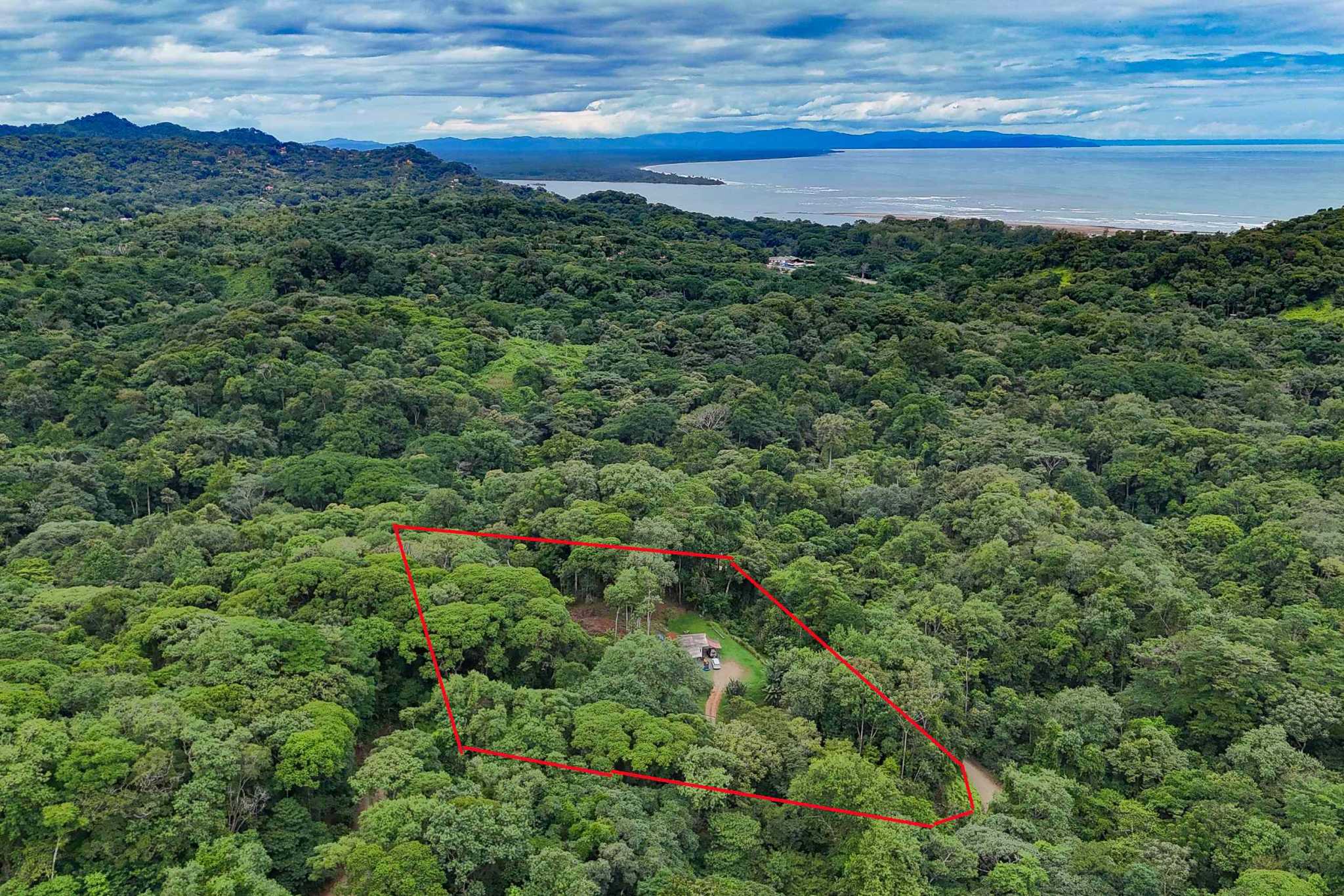41167 (5) Large 2.1 Acre Jungle Property with a 1-Bed home & Numerous Additional Building Sites on Cinco Ventanas Road in Ojochal Costa Rica