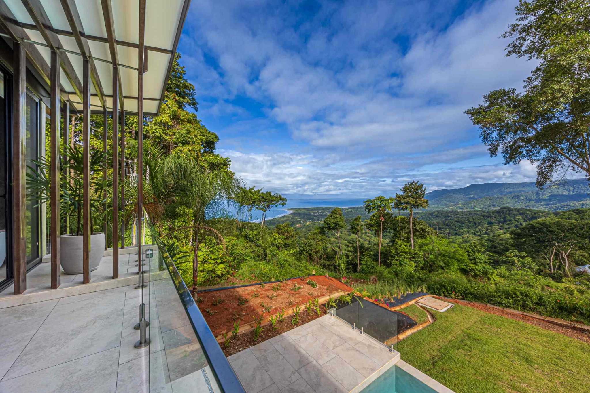 New-Construction Estate Property with 5+ Acres, Modern Style & Ocean Views of the Whale’s Tail in Uvita Costa Rica