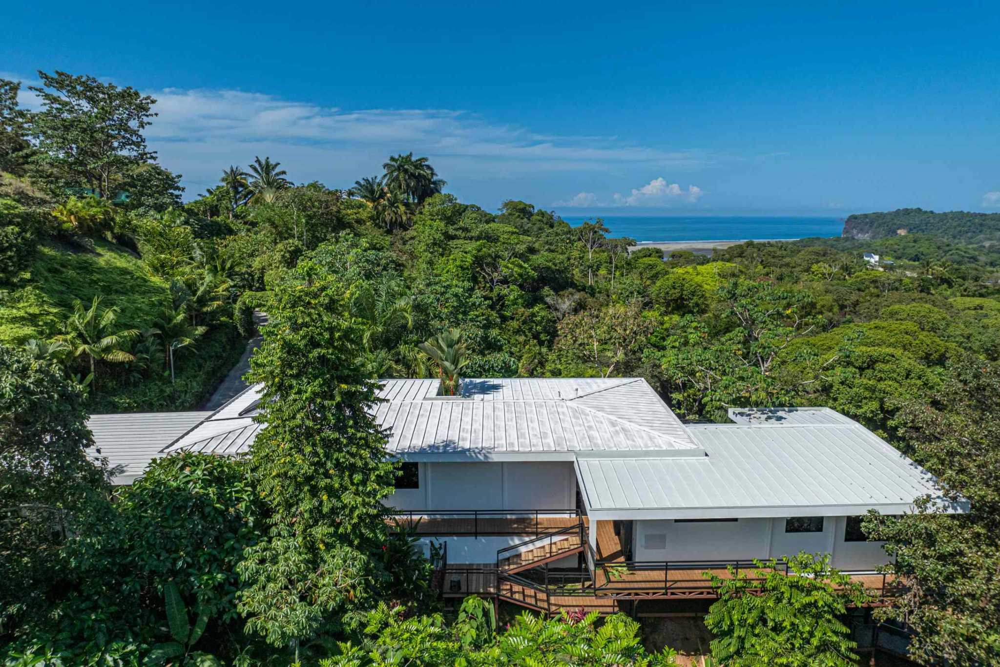 Stunning Mountain & Ocean Views in a 3-Bedroom Luxury Home on Calle Perezoso in Ojochal Costa Rica