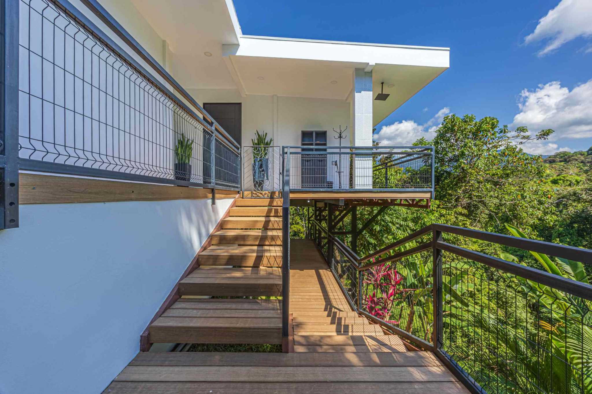 Stunning Mountain & Ocean Views in a 3-Bedroom Luxury Home on Calle Perezoso in Ojochal Costa Rica