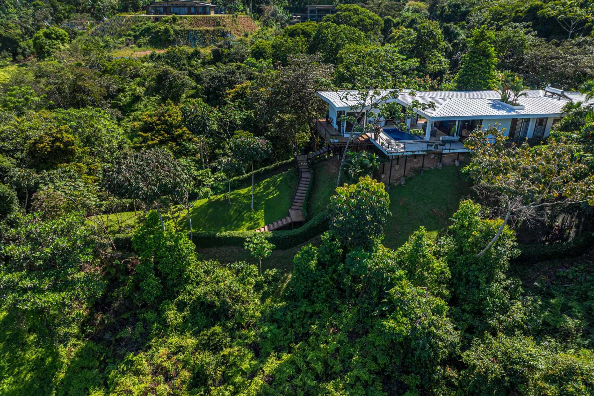 Stunning Mountain & Ocean Views in a 3-Bedroom Luxury Home on Calle Perezoso in Ojochal Costa Rica