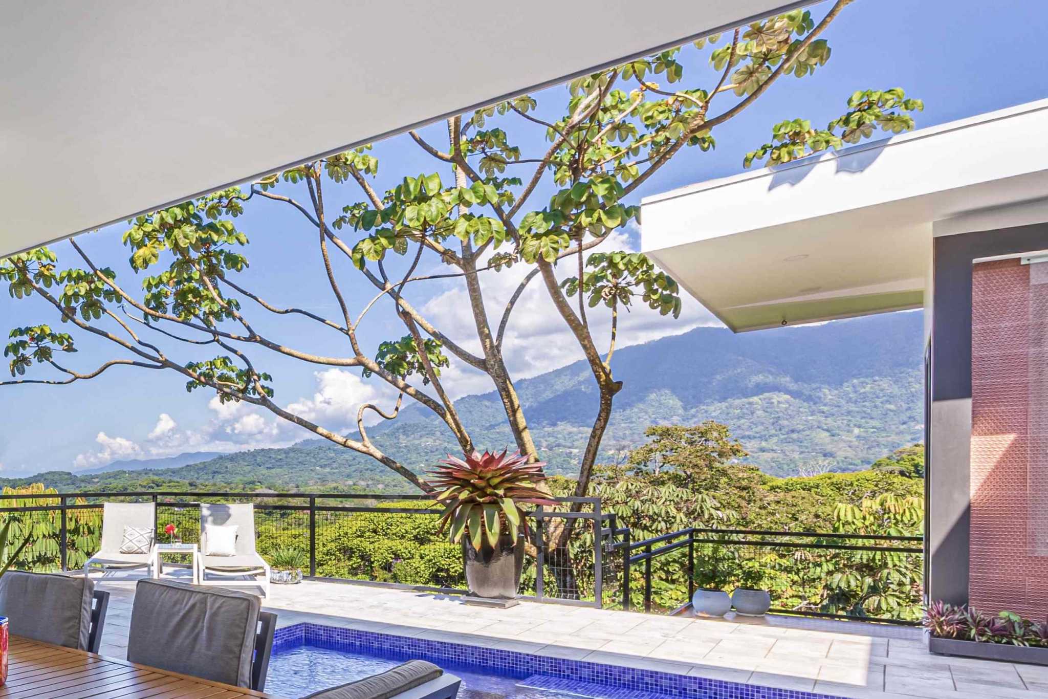 Stunning Mountain & Ocean Views in a 3-Bedroom Luxury Home on Calle Perezoso in Ojochal Costa Rica