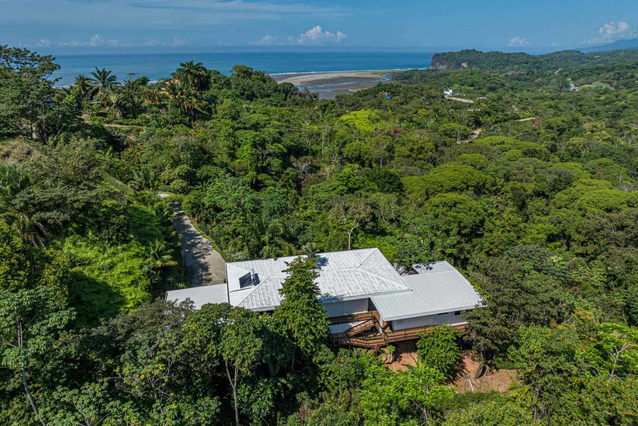 Stunning Mountain & Ocean Views in a 3-Bedroom Luxury Home on Calle Perezoso in Ojochal Costa Rica