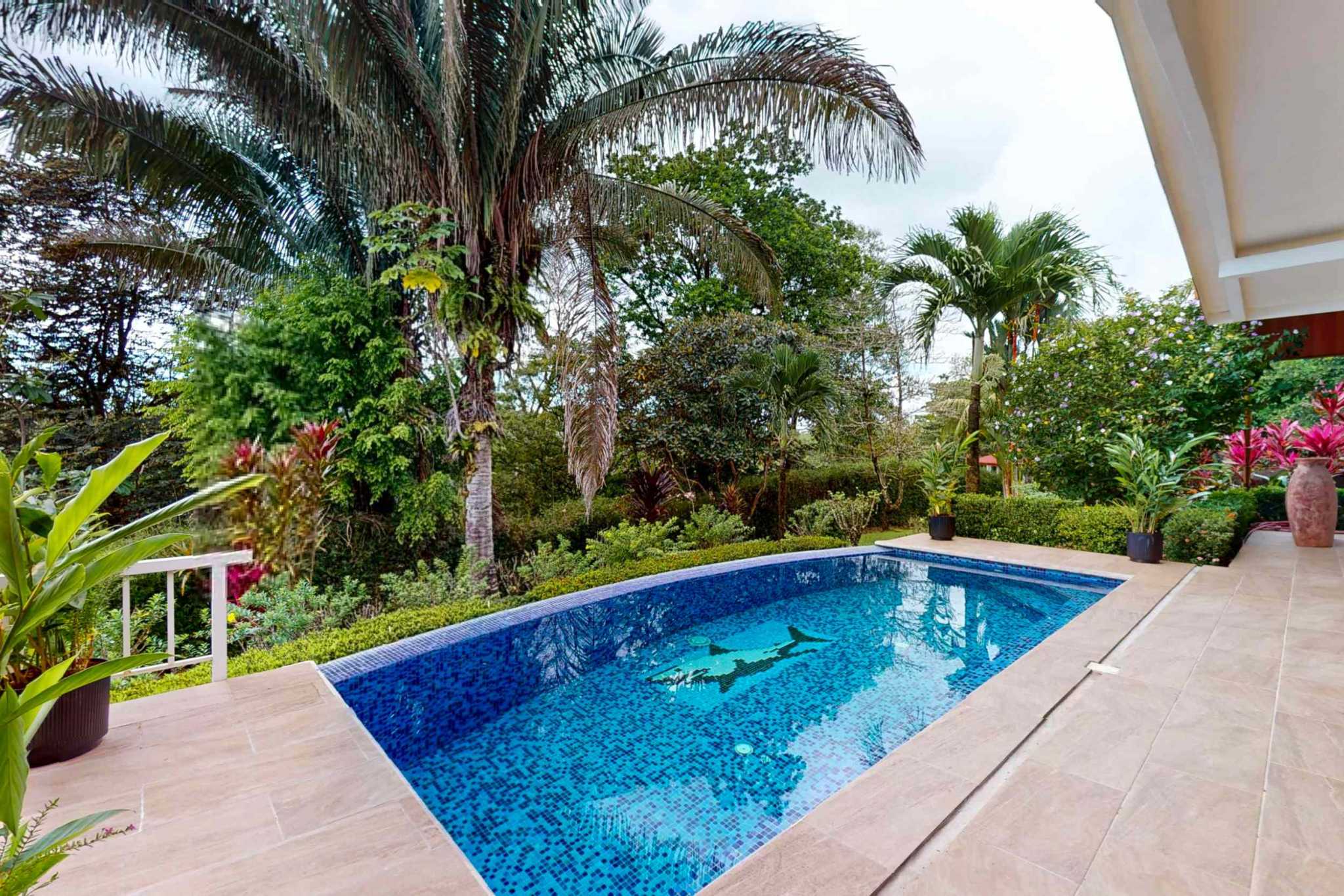 Charming 3 Bedroom Home on Lush Acreage with Pocket Ocean View in Ojochal Costa Rica
