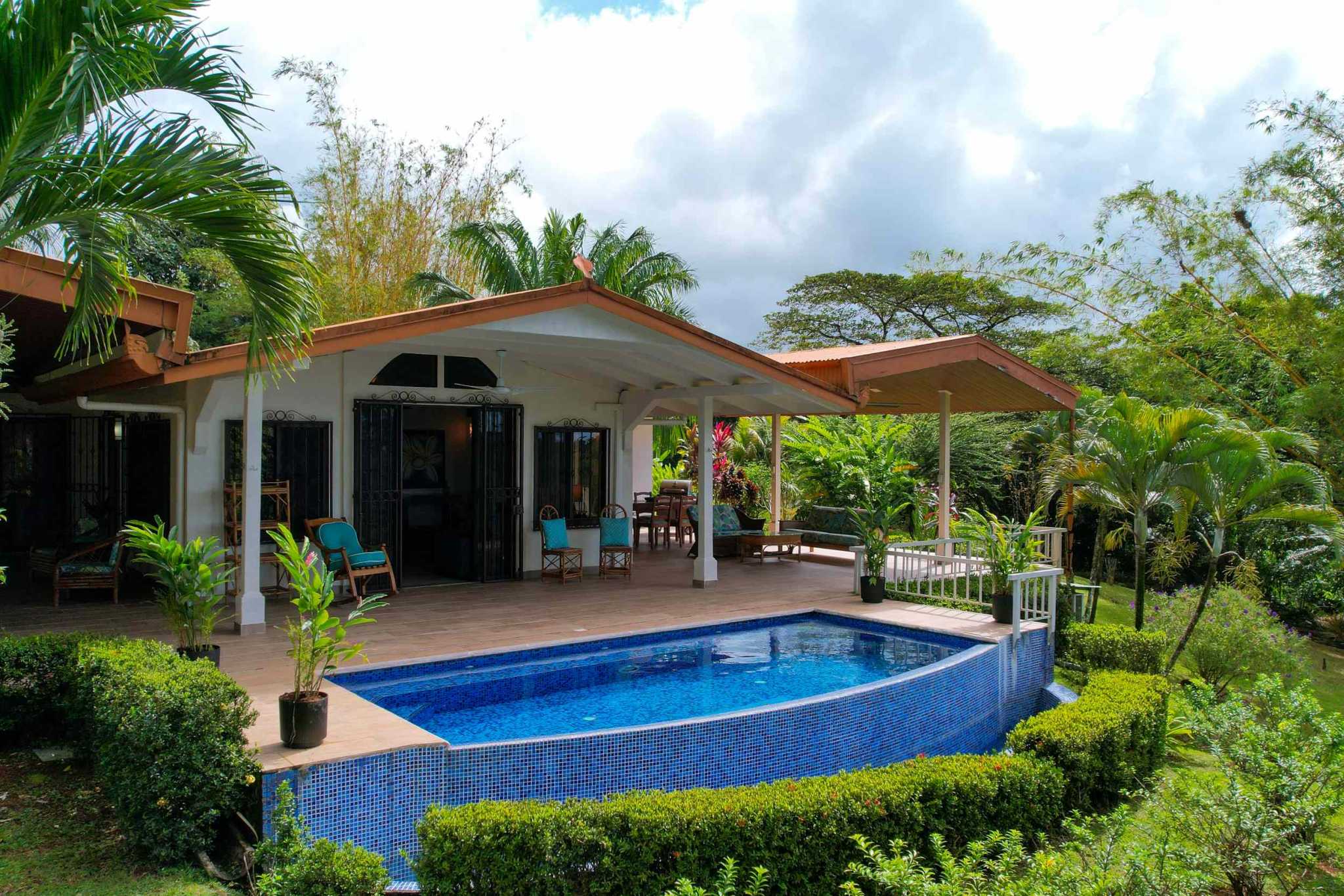 Charming 3 Bedroom Home on Lush Acreage with Pocket Ocean View in Ojochal Costa Rica
