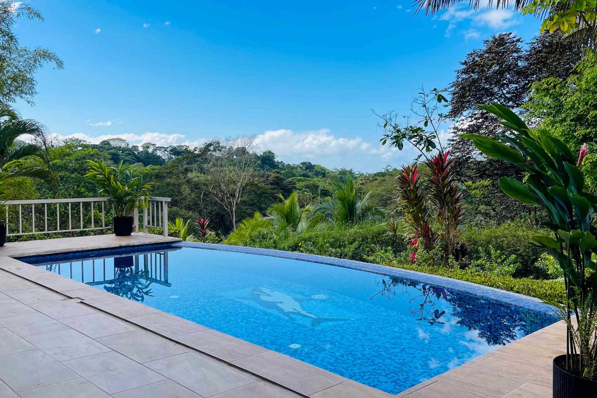 Charming 3 Bedroom Home on Lush Acreage with Pocket Ocean View in Ojochal Costa Rica