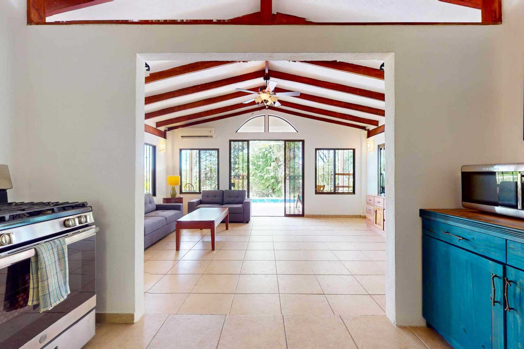 Charming 3 Bedroom Home on Lush Acreage with Pocket Ocean View in Ojochal Costa Rica