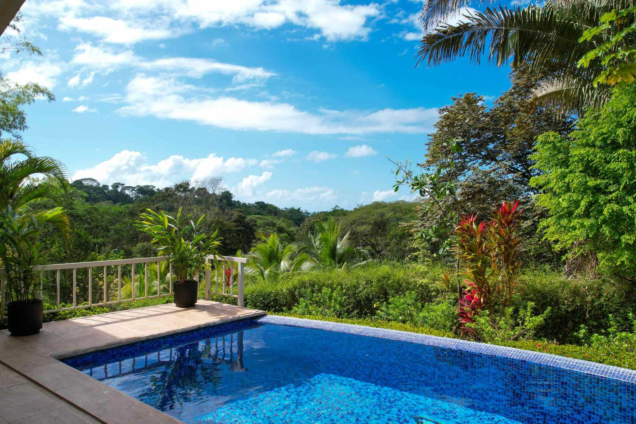 Charming 3 Bedroom Home on Lush Acreage with Pocket Ocean View in Ojochal Costa Rica