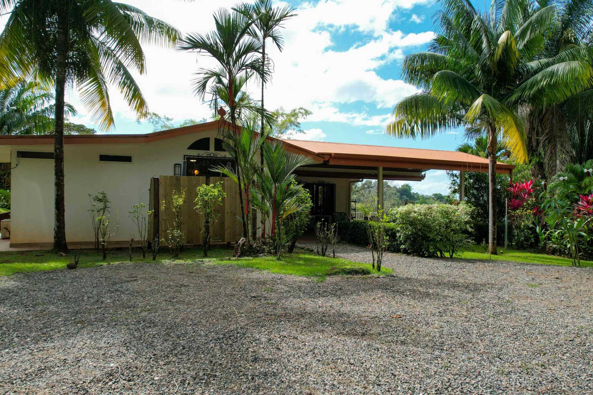 Charming 3 Bedroom Home on Lush Acreage with Pocket Ocean View in Ojochal Costa Rica