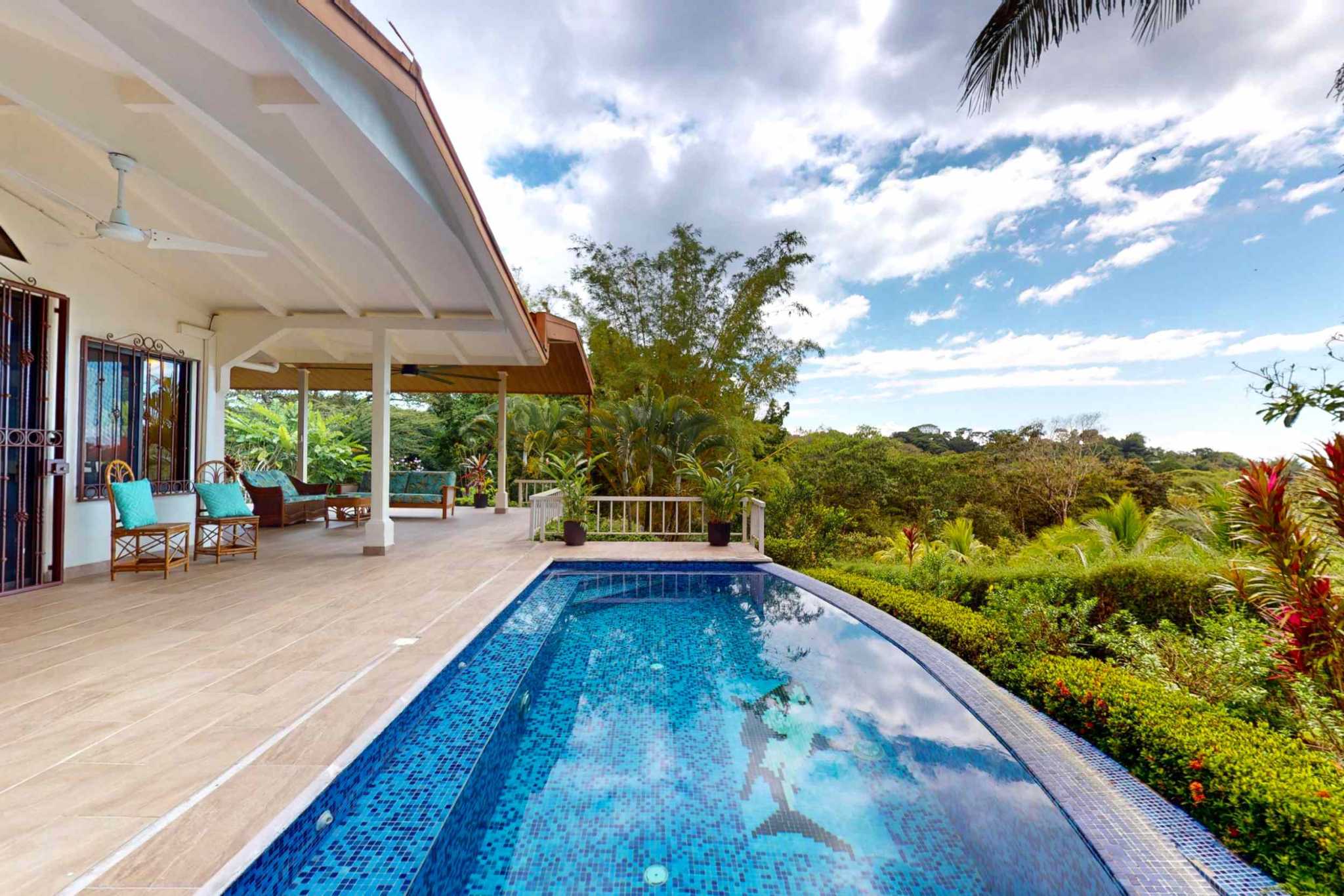 Charming 3 Bedroom Home on Lush Acreage with Pocket Ocean View in Ojochal Costa Rica
