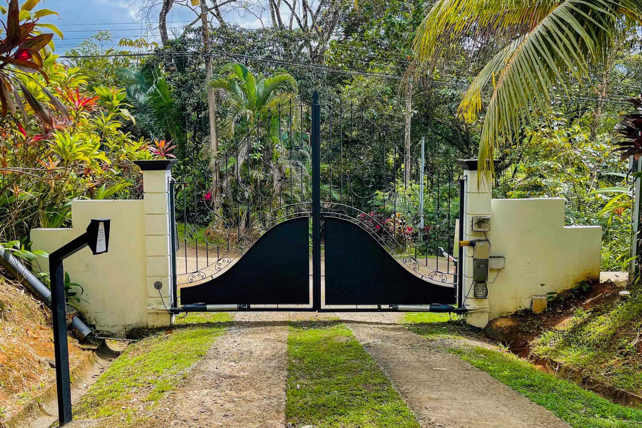 Charming 3 Bedroom Home on Lush Acreage with Pocket Ocean View in Ojochal Costa Rica