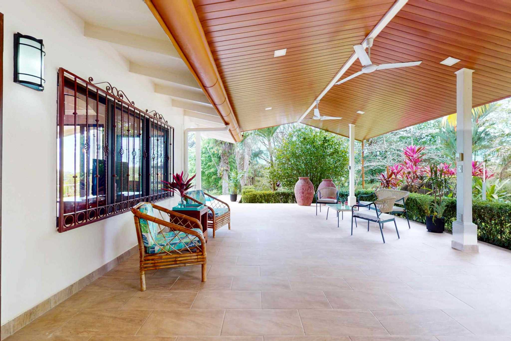 Charming 3 Bedroom Home on Lush Acreage with Pocket Ocean View in Ojochal Costa Rica