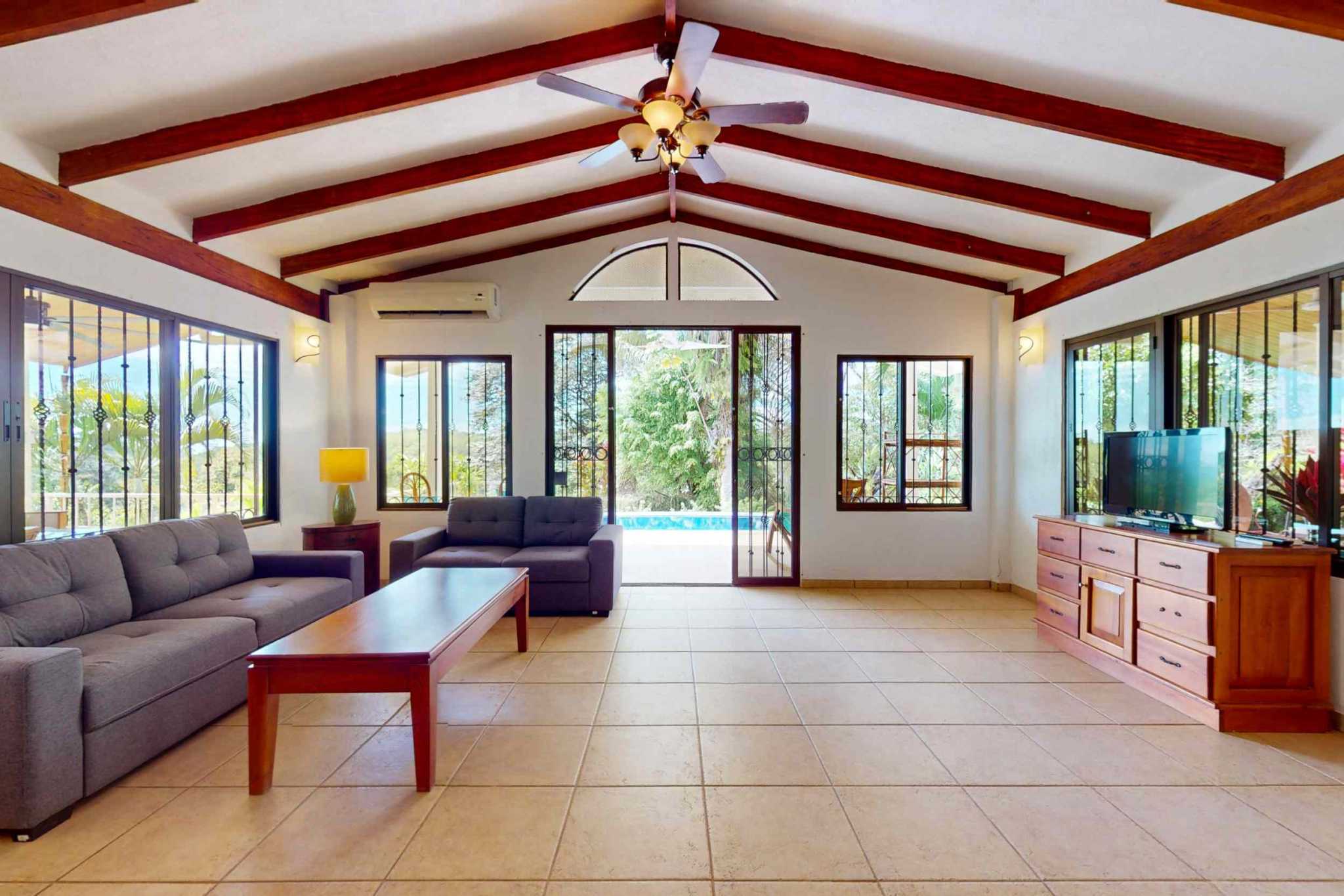 Charming 3 Bedroom Home on Lush Acreage with Pocket Ocean View in Ojochal Costa Rica