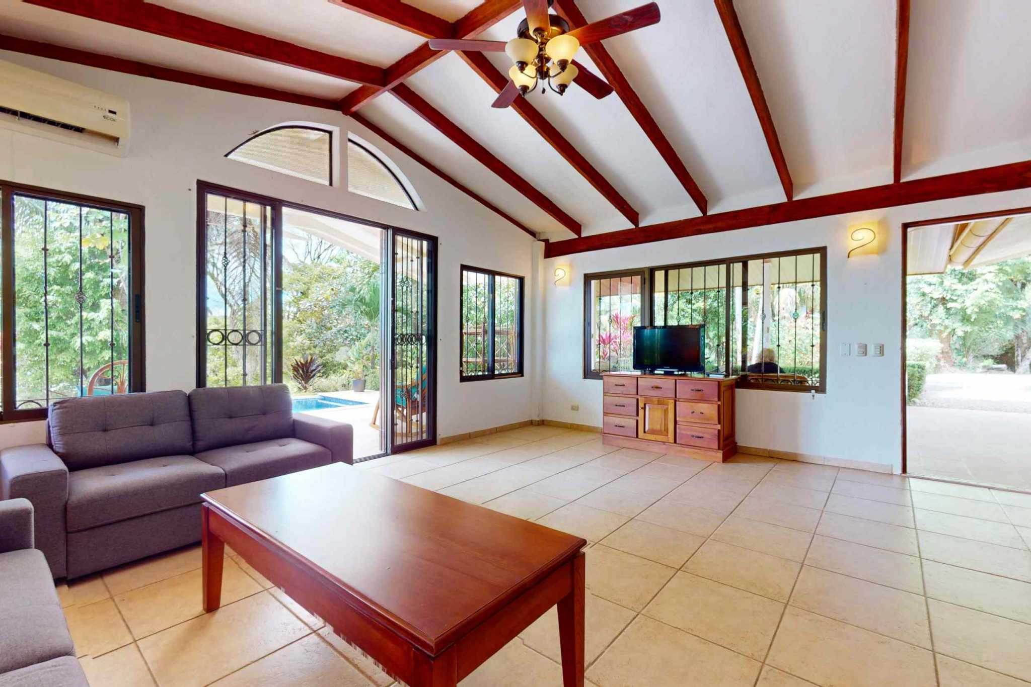 Charming 3 Bedroom Home on Lush Acreage with Pocket Ocean View in Ojochal Costa Rica