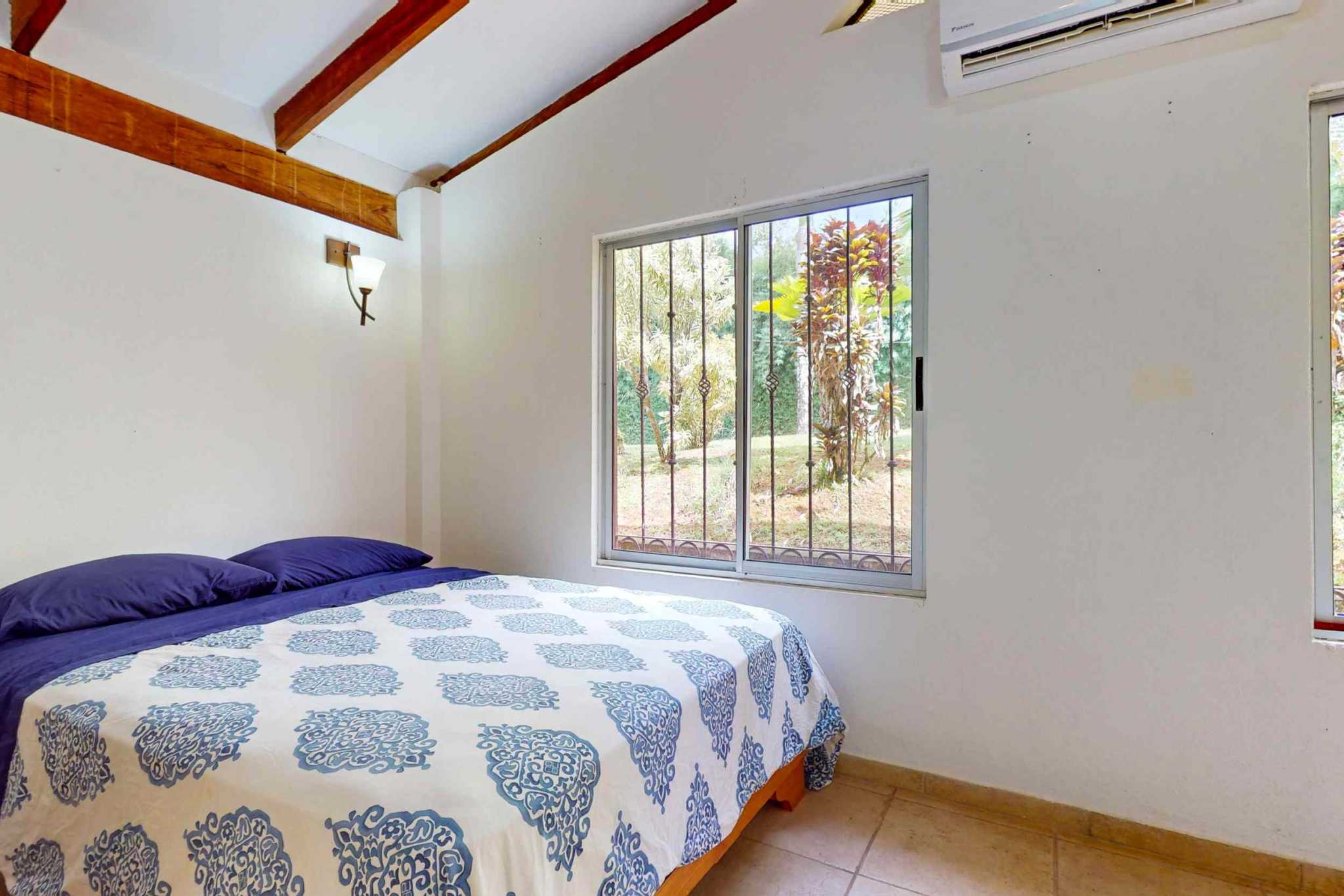 Charming 3 Bedroom Home on Lush Acreage with Pocket Ocean View in Ojochal Costa Rica