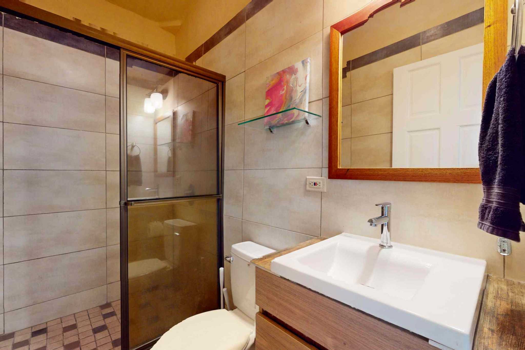 Charming 3 Bedroom Home on Lush Acreage with Pocket Ocean View in Ojochal Costa Rica