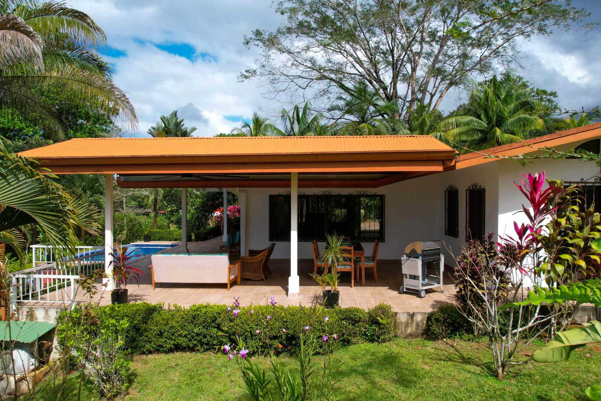 Charming 3 Bedroom Home on Lush Acreage with Pocket Ocean View in Ojochal Costa Rica